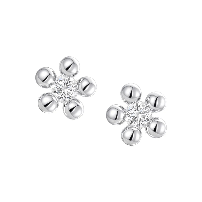 SUN HUNTER island flower silver earrings with sparkling center stones and floral design