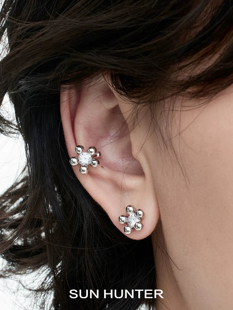 SUN HUNTER island flower silver earrings featuring sparkling floral design for elegant style