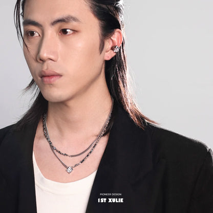 Stylish Y2K punk necklace layered on a model with a sleek hairstyle and modern attire