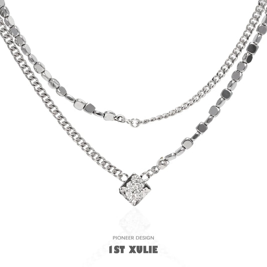 1STXULIE Y2K punk necklace featuring layered silver chains and a sparkling diamond-shaped pendant