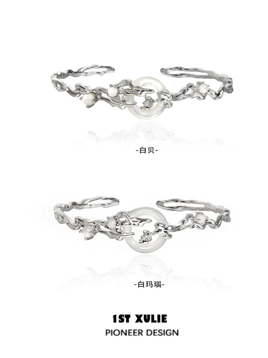 Elegant jade rabbit white agate silver bracelet featuring a delicate design and shimmering details
