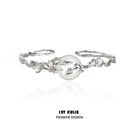 Elegant jade rabbit white agate silver bracelet featuring intricate design and polished finish