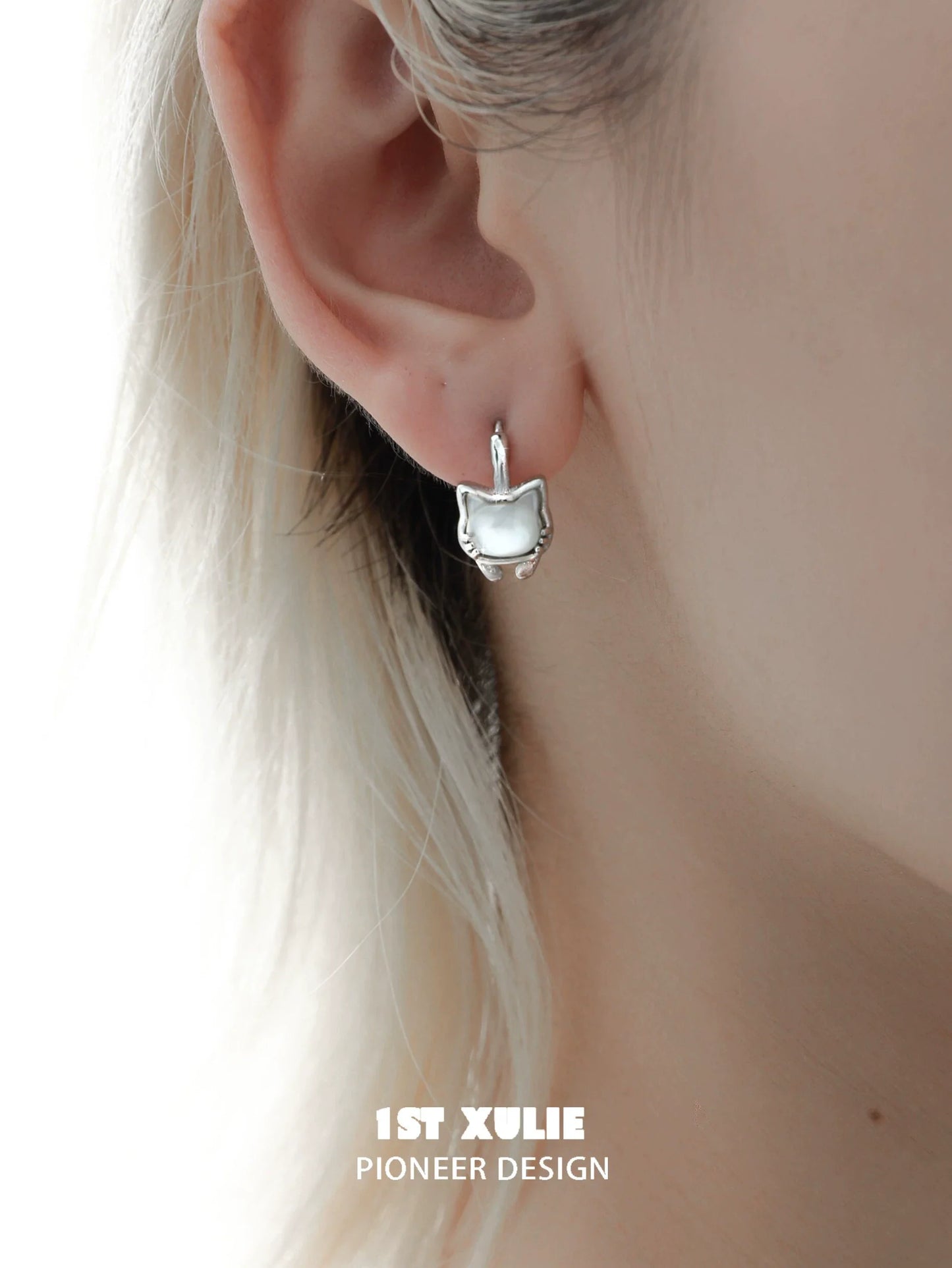 Silver kitten stud earrings featuring a cute cat design for animal lovers