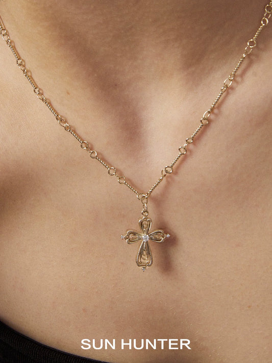 SUN HUNTER lace cross necklace with delicate design, perfect for everyday elegance
