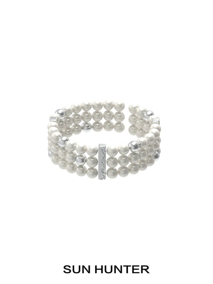 SUN HUNTER layered pearl bracelet with multiple strands of elegant pearls for a stylish look