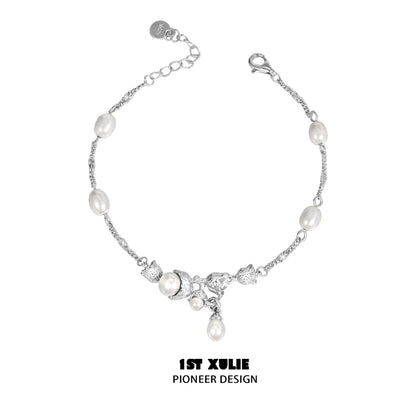 Elegant lily of the valley pearl bracelet featuring silver accents and unique floral design