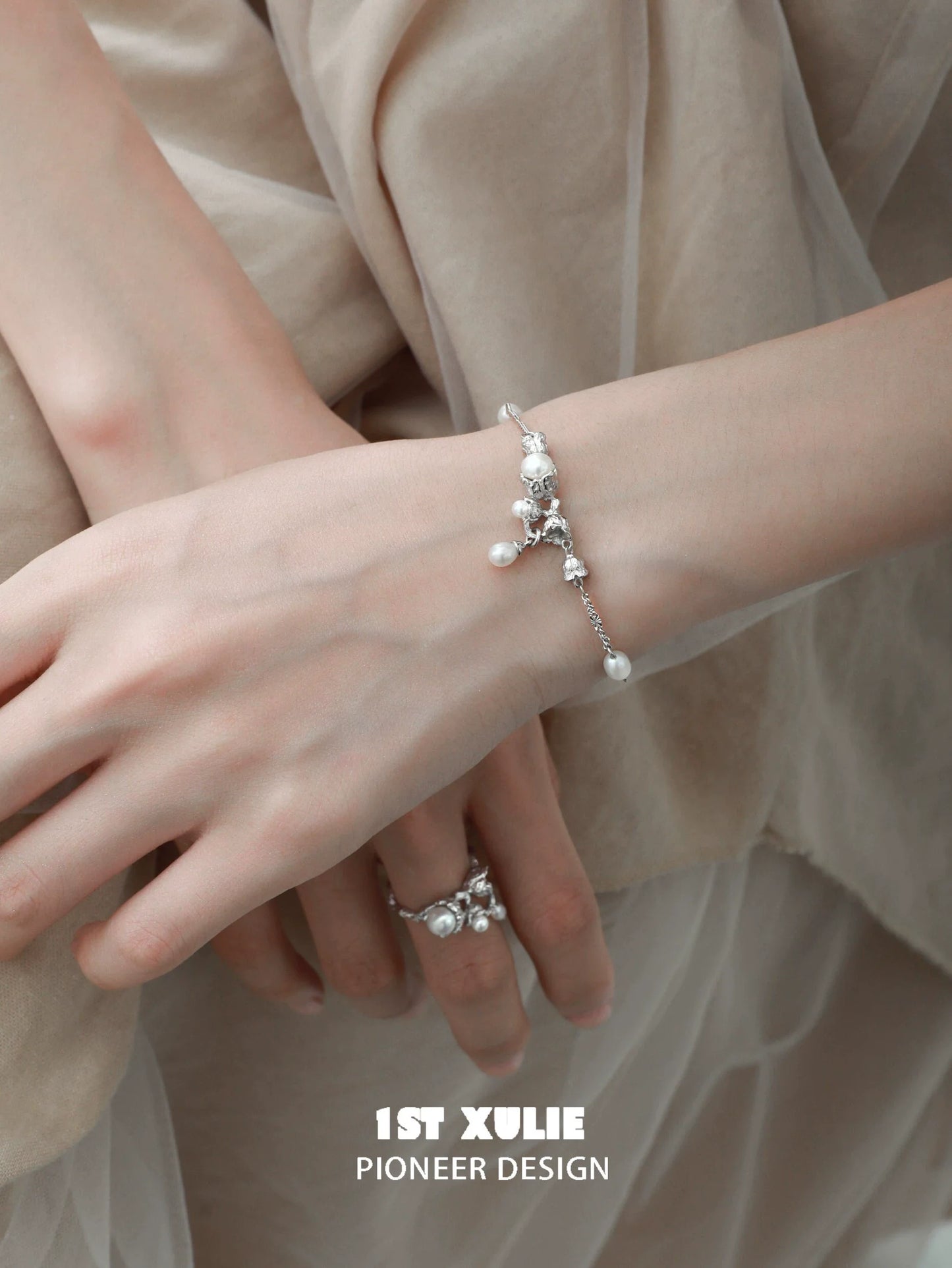 Elegant lily of the valley pearl bracelet featuring delicate floral designs and shimmering pearls