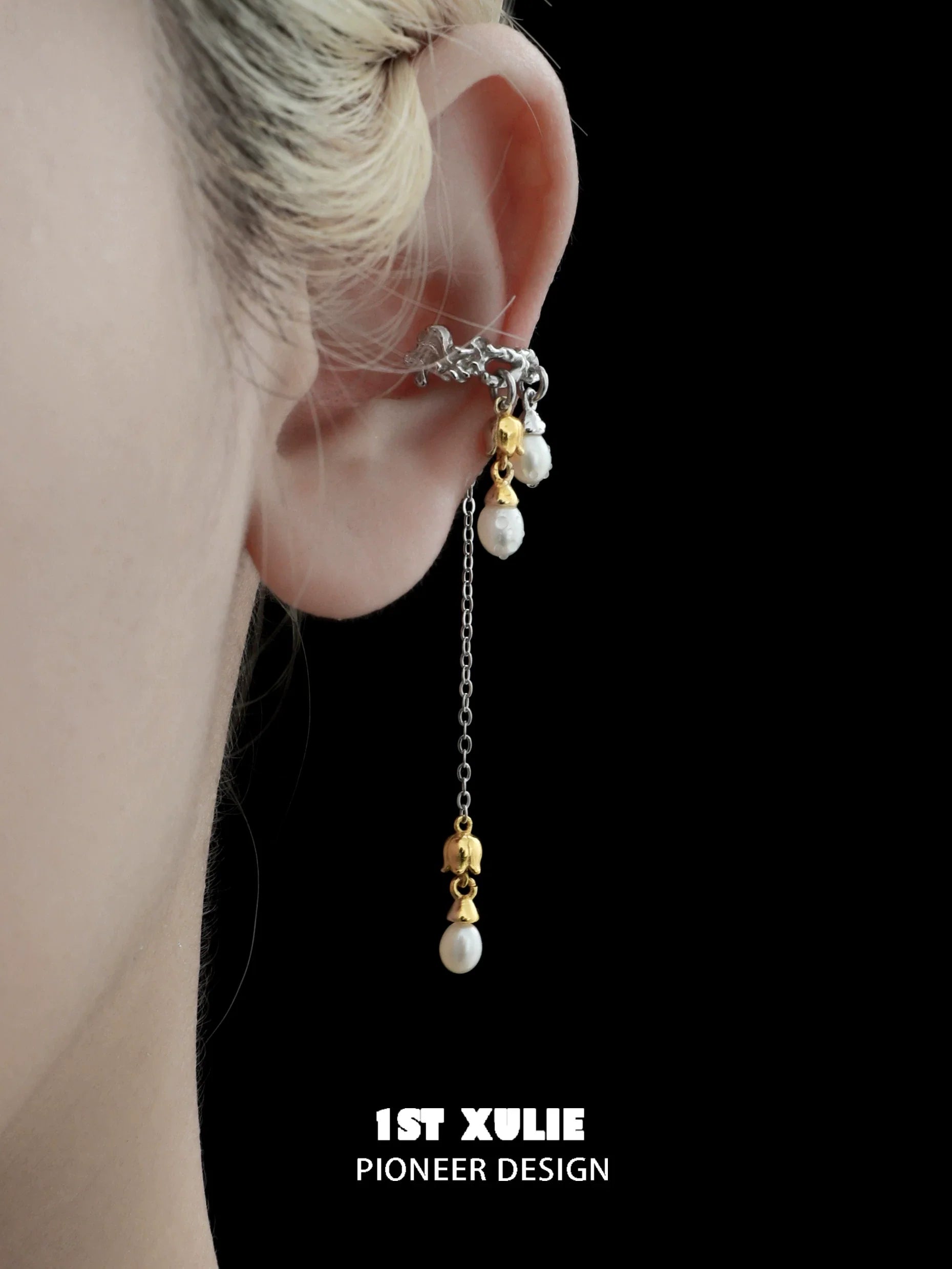 Lily tassel pearl ear cuff with elegant dangling design showcased on a model's ear