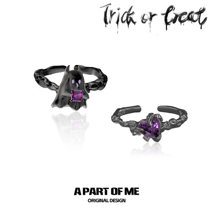 A PART OF ME little demon goth ring featuring a black design with a purple gemstone accent