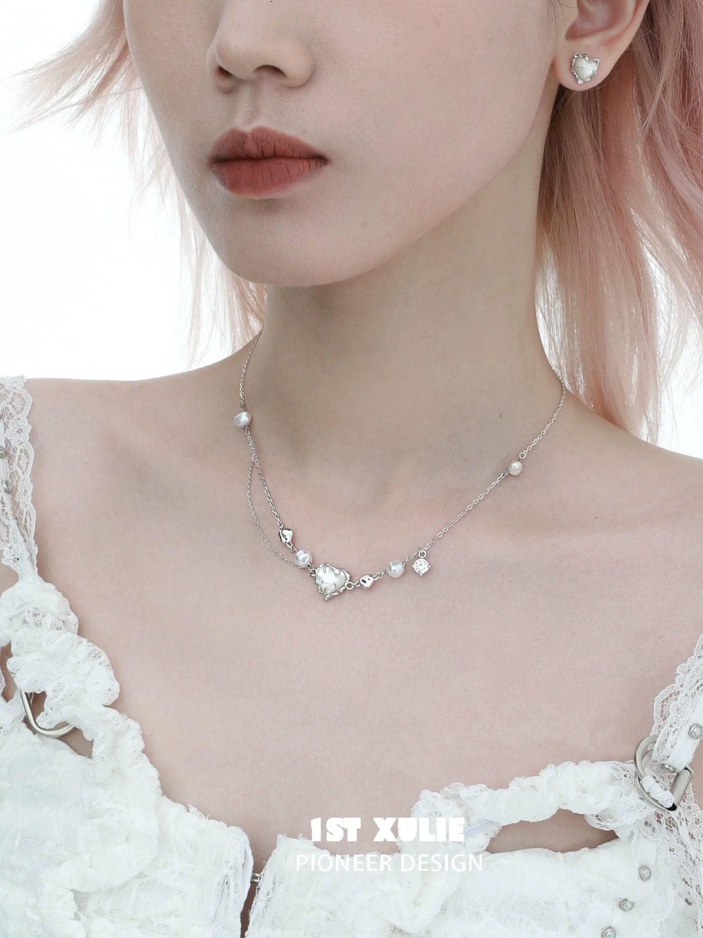 Love fritillary silver necklace featuring elegant heart and pearl accents for a chic look