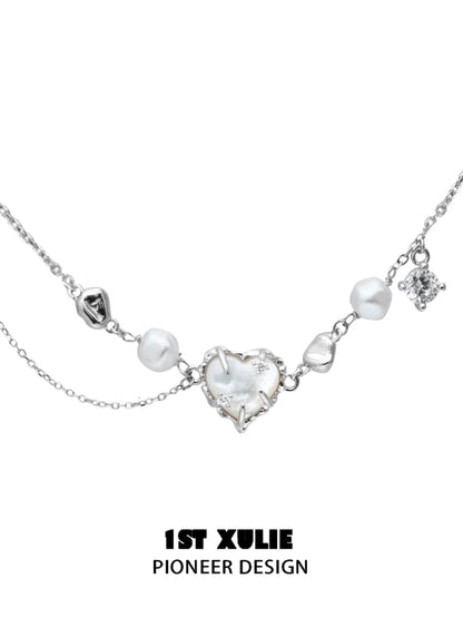 Love fritillary silver necklace featuring delicate pearls and sparkling accents for elegant styling