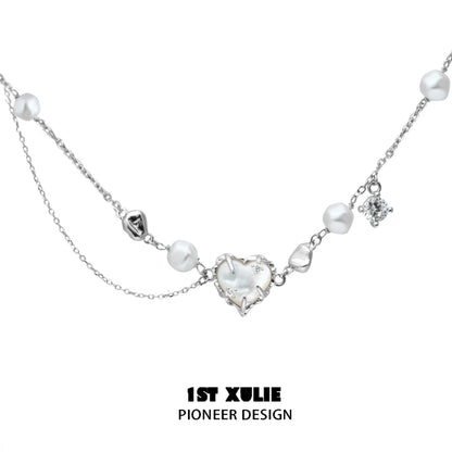Love fritillary silver necklace featuring heart and pearl accents for a charming look