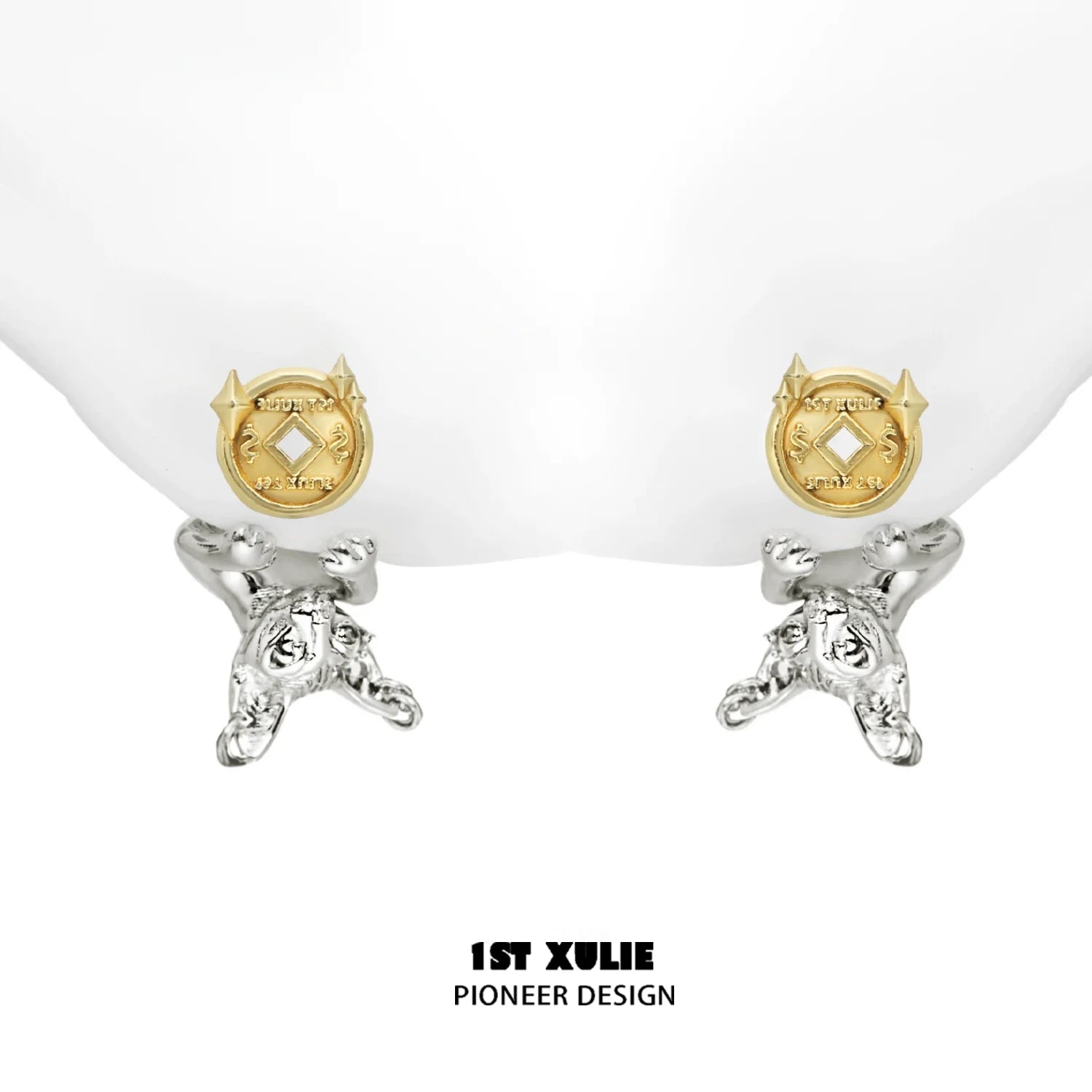 Lucky coin cat stud earrings in silver and gold design for unique fashion statement
