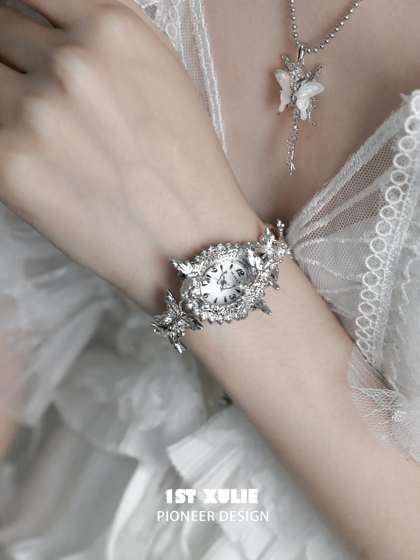 Machinery aesthetic butterfly bracelet watch by 1STXULIE featuring intricate design and silver finish