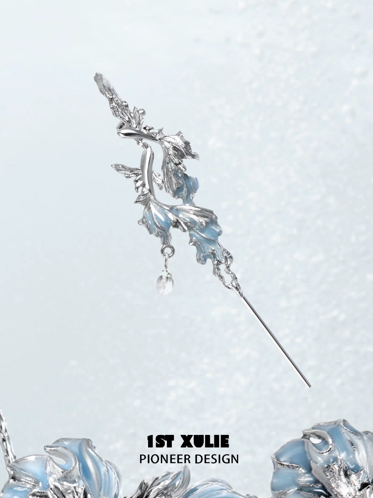 1ST XULIE mermaid tail ear piercing jewelry in silver with elegant design and blue accents
