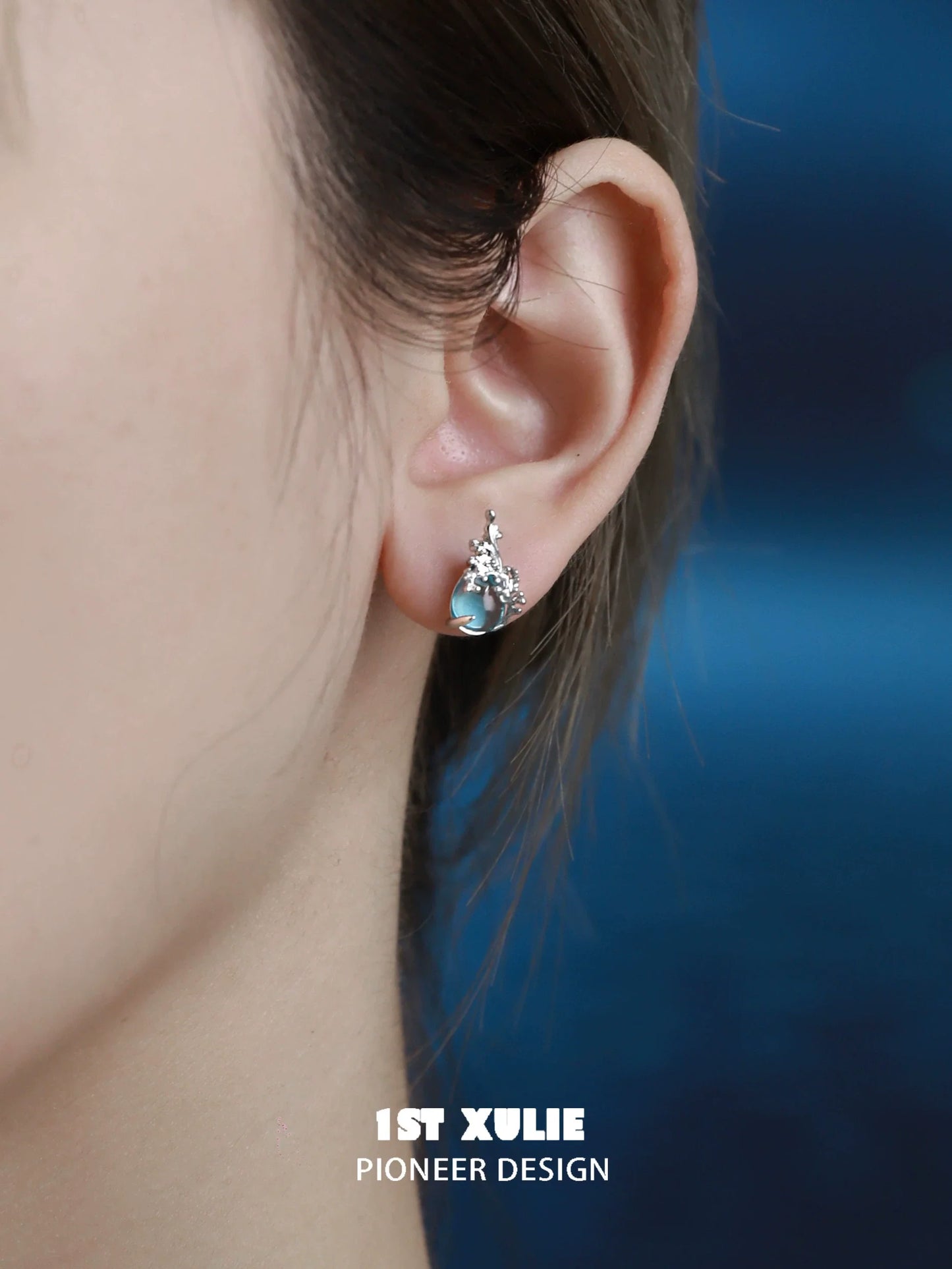 Elegant mermaid tear earrings in silver, featuring a shimmering design perfect for special occasions