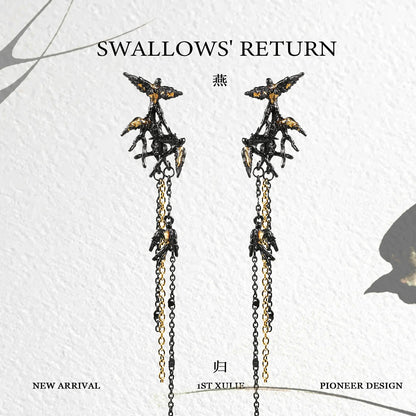 Midnight swallow gothic earrings featuring intricate bird designs and cascading chains for a bold look