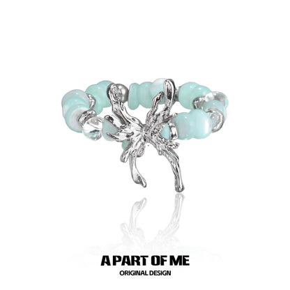 Mint butterfly beaded ring with silver butterfly detailing and smooth beads for a trendy look