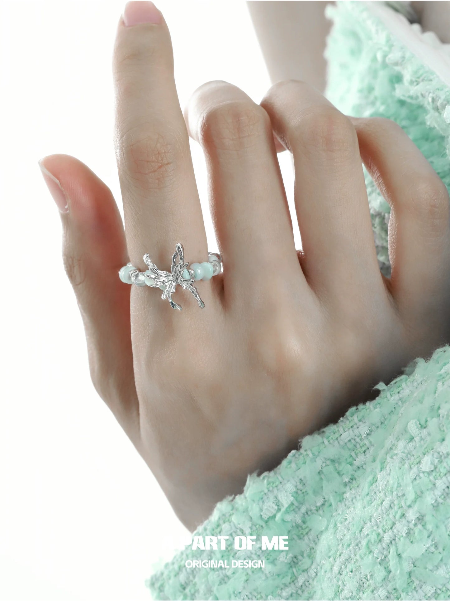 Mint butterfly beaded ring designed by A PART OF ME featuring delicate butterfly accents