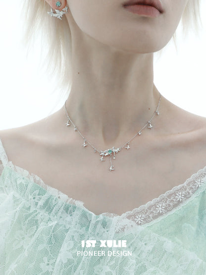 Mint butterfly necklace with delicate design, featuring sparkling accents for an elegant look