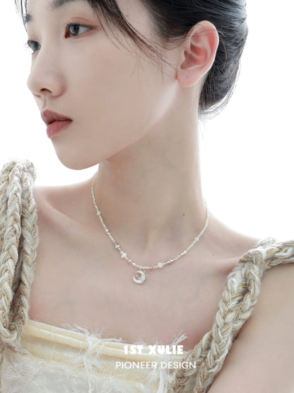 Elegant moon beaded clavicle chain necklace with delicate pearl accents for a stylish look.