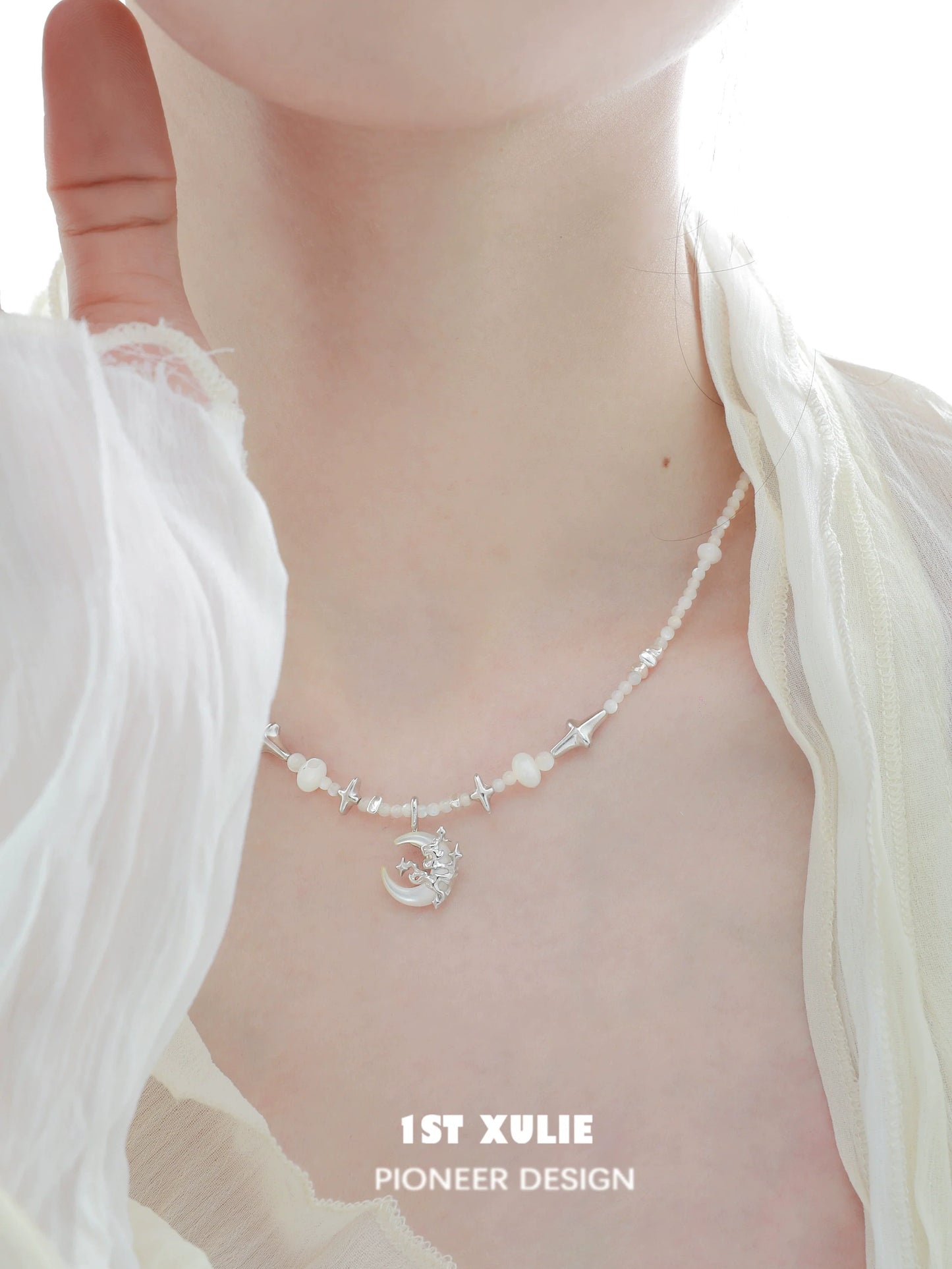 Moon beaded clavicle chain necklace featuring silver moon pendant and delicate beads
