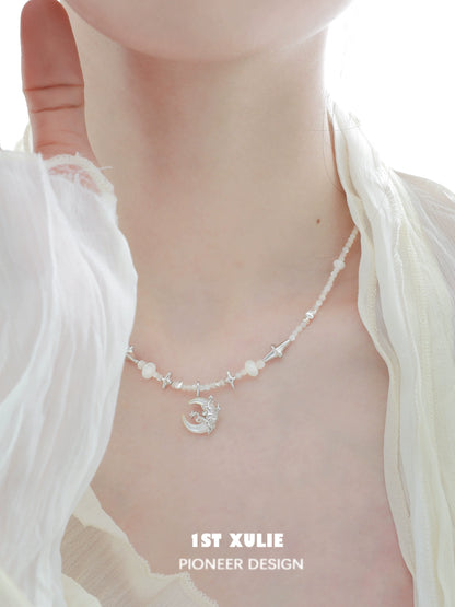 Moon beaded clavicle chain necklace featuring silver moon pendant and delicate beads