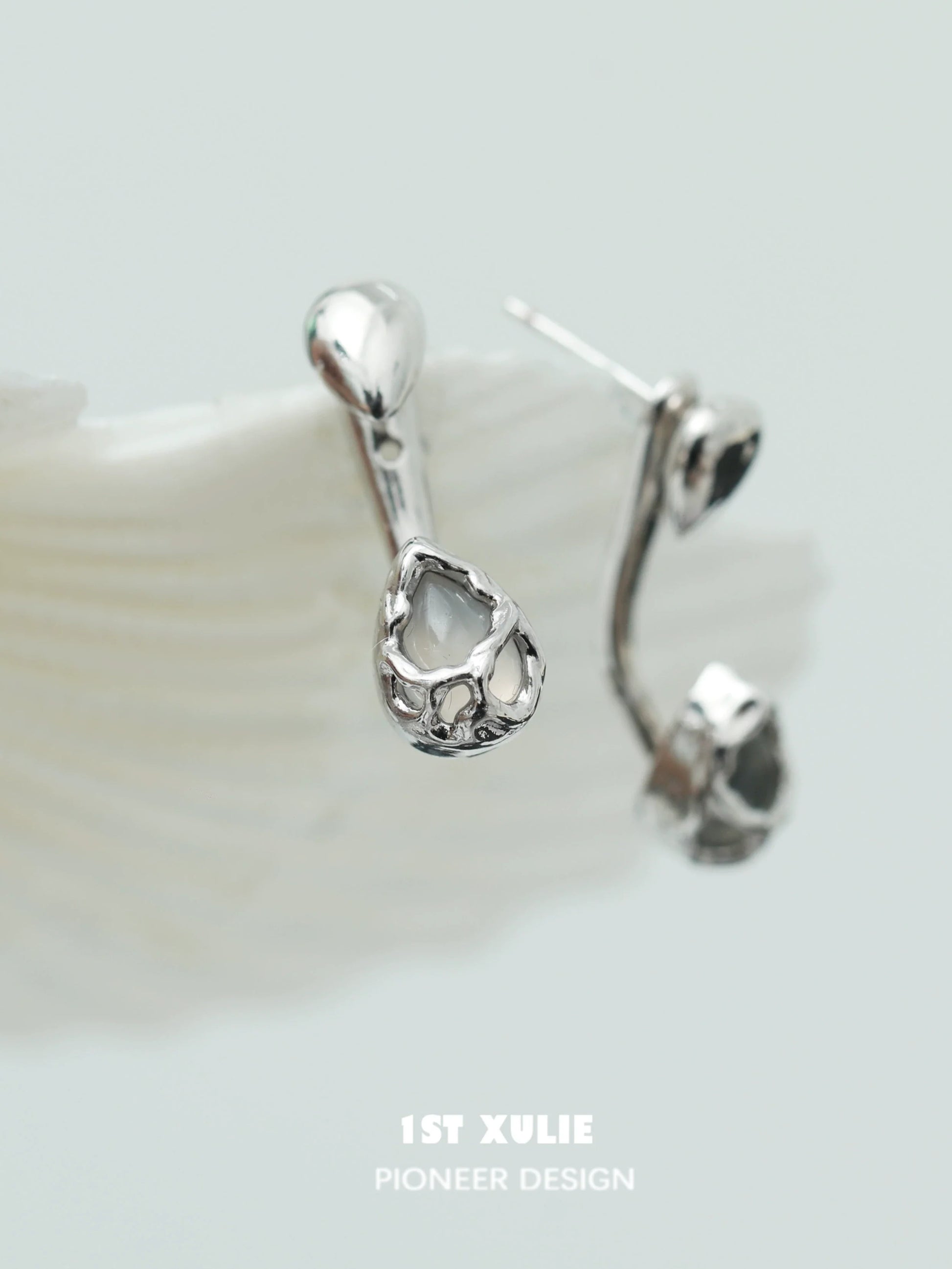 Elegant moonlit agate earrings in silver with unique tear-drop design for a stylish look
