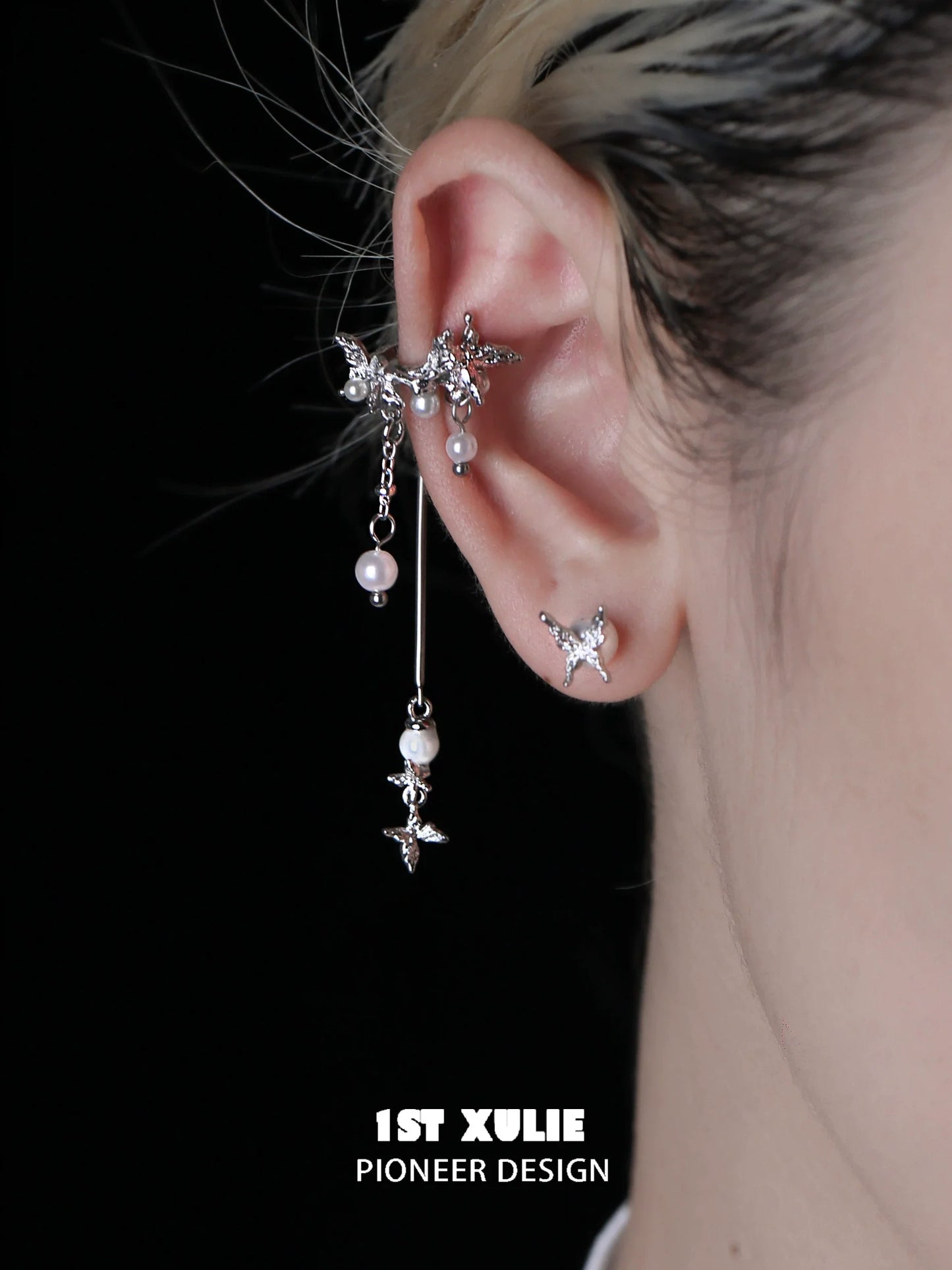 Mystic butterfly ear clips featuring silver design with pearls for a unique and elegant look