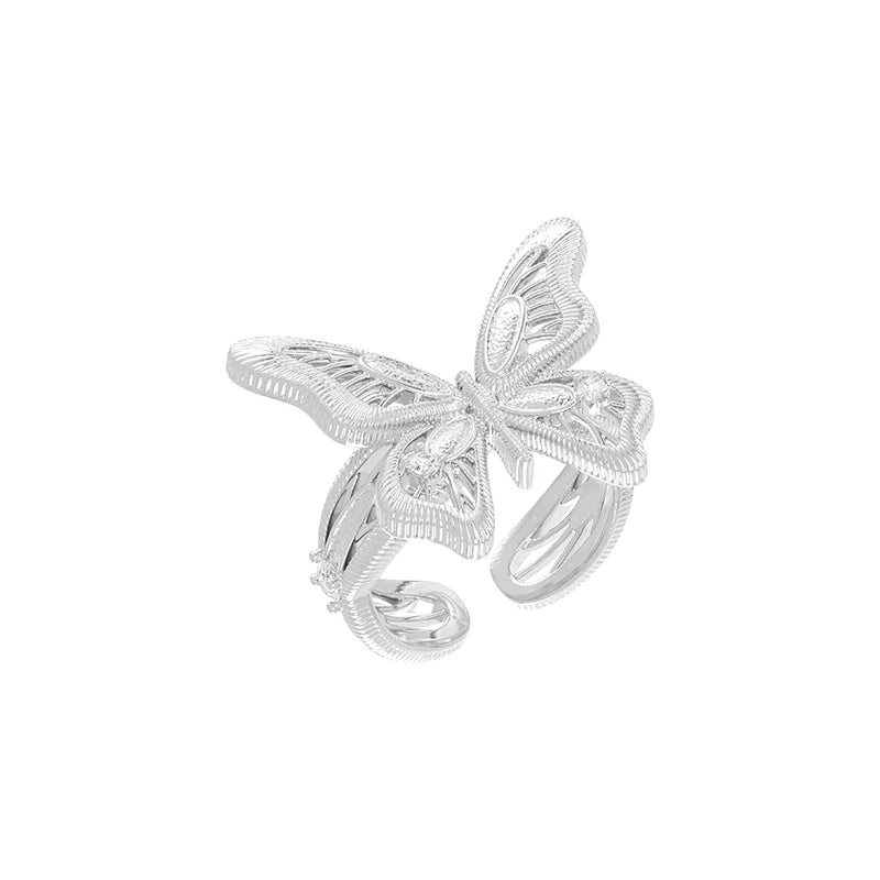 Elegant silver mystic butterfly ring with intricate detailing and open design