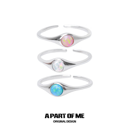 Three A PART OF ME opal color change rings in silver with colorful opal stones