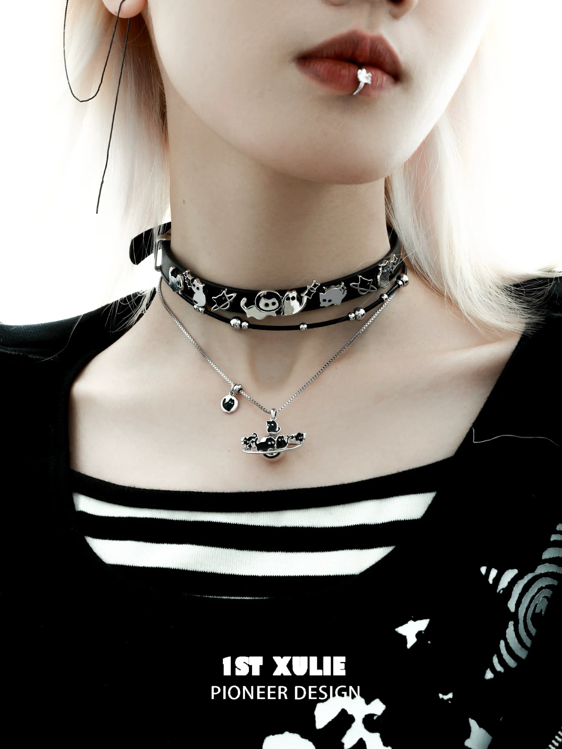 Stylish 1STXULIE owl leather necklace layered with silver chains for a unique fashion statement