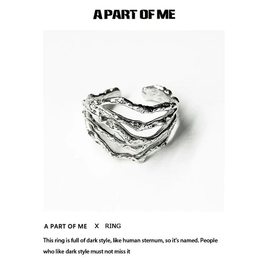 Bone minimalist ring by A PART OF ME featuring a dark, organic design inspired by human sternum