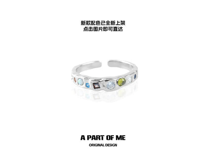 A PART OF ME colorful moonstone ring featuring multiple gemstones in a sleek silver band