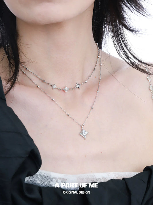 Layered starlight planet silver necklace featuring delicate star charms for a stylish look