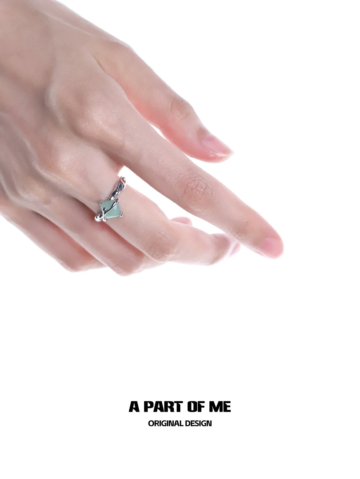 Unique silver gothic ring displayed on a hand with elegant design and intricate details