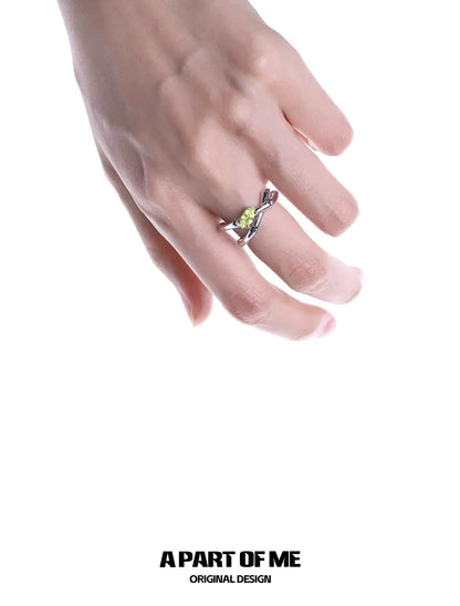 Hand wearing a yellow turquoise bamboo ring with a unique design from A PART OF ME