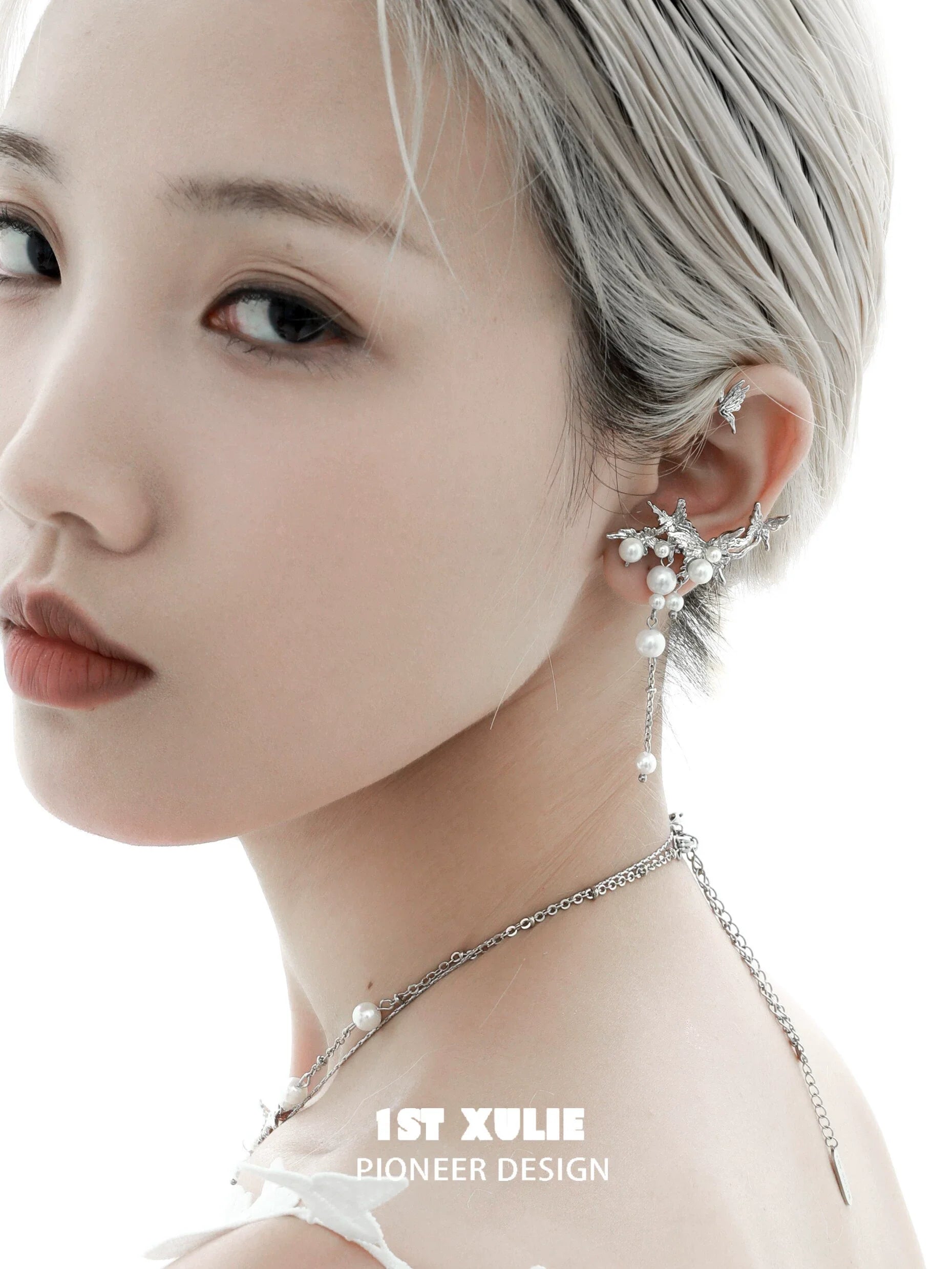 Stylish pearl butterfly ear cuffs from 1STXULIE designed to enhance any modern look