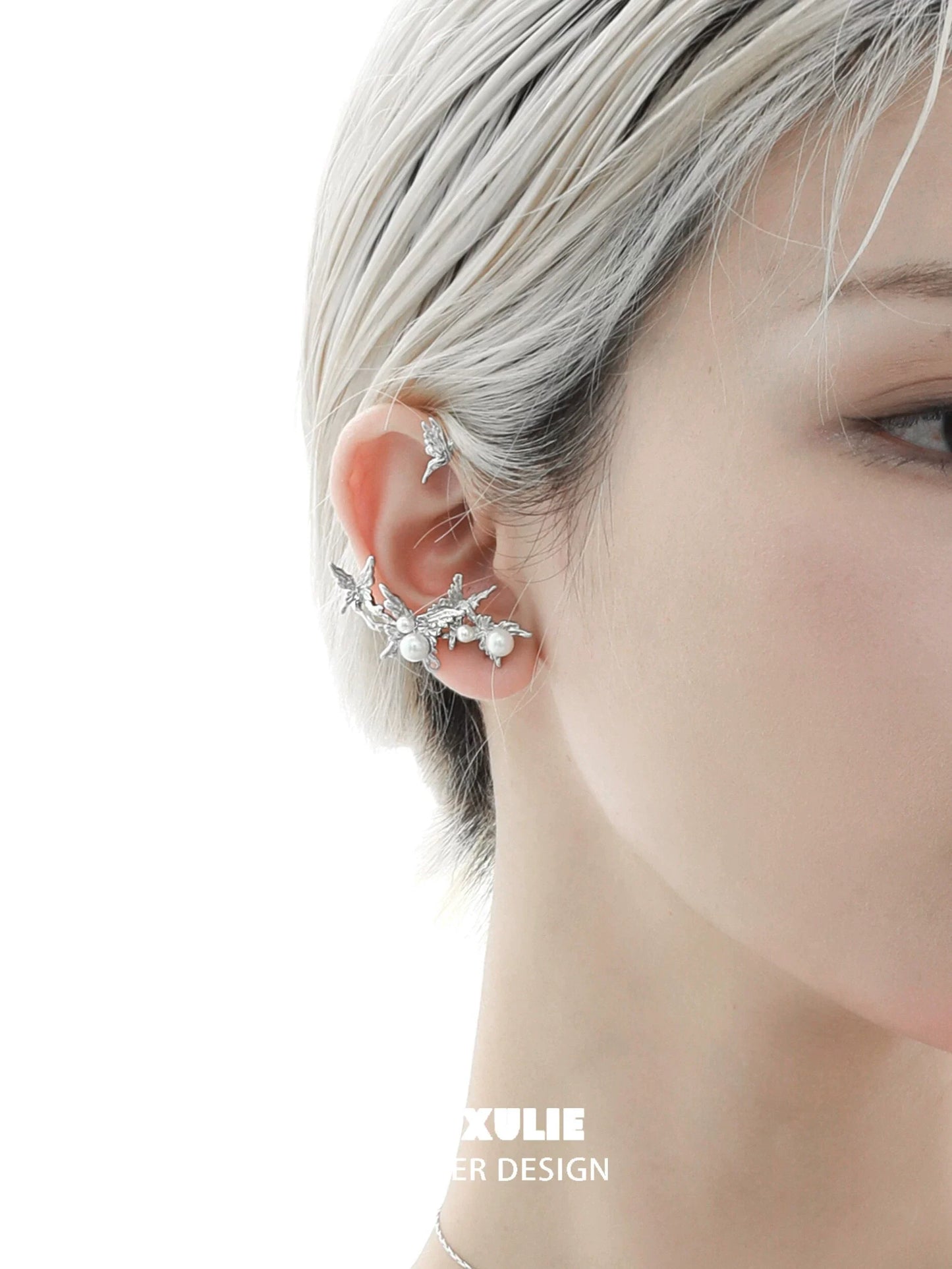 Elegant pearl butterfly ear cuffs designed to enhance any outfit with a touch of charm