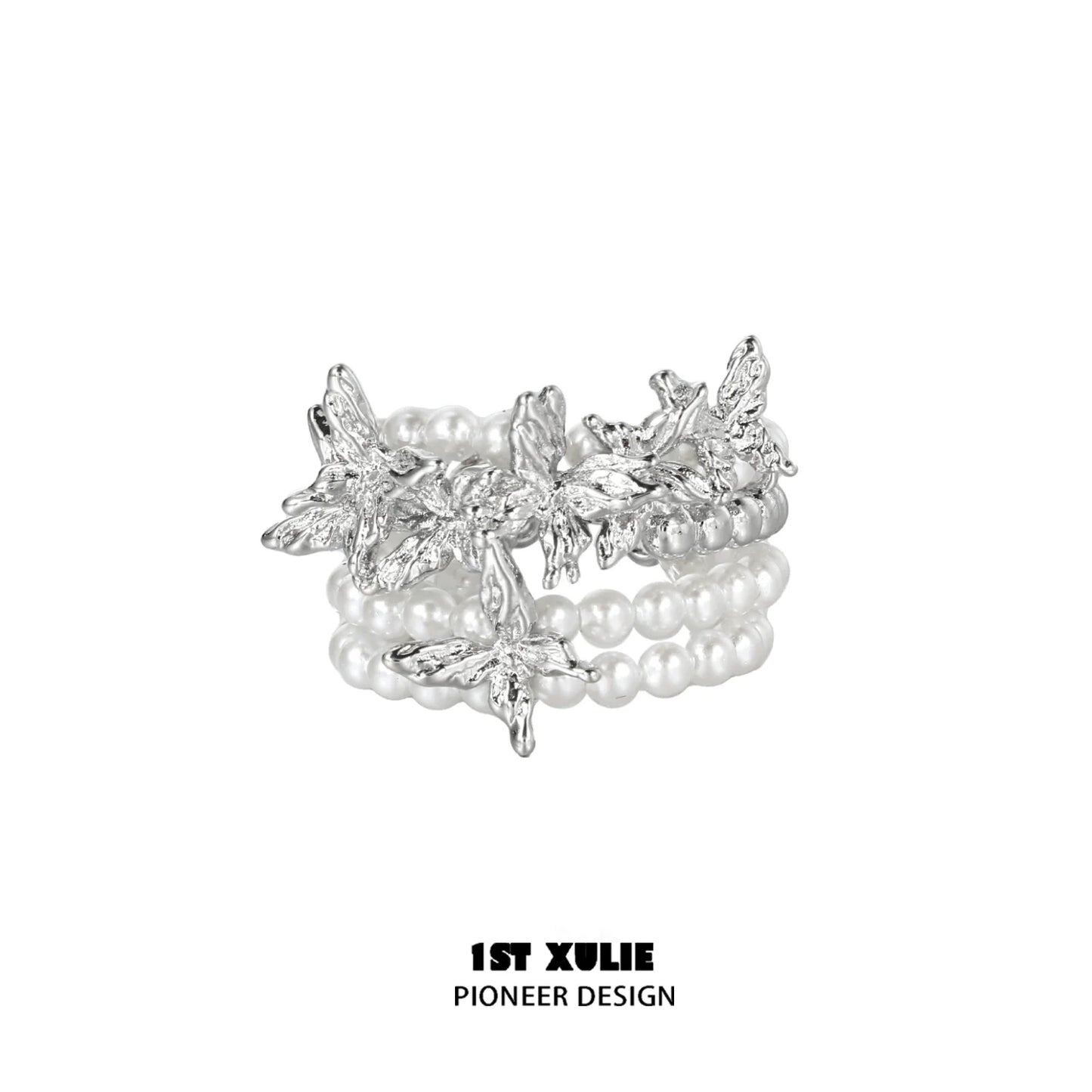 1ST XULIE pearl butterfly ring featuring intricate leaf designs and elegant pearl accents