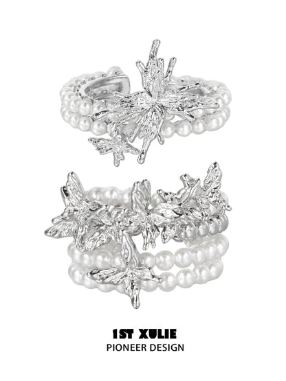 Elegant pearl butterfly ring with silver detailing and multiple pearl strands for a vintage look