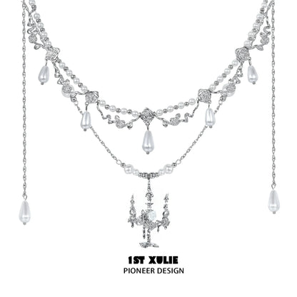 Elegant 1STXULIE pearl clavicle necklace featuring intricate silver designs and dangling pearls