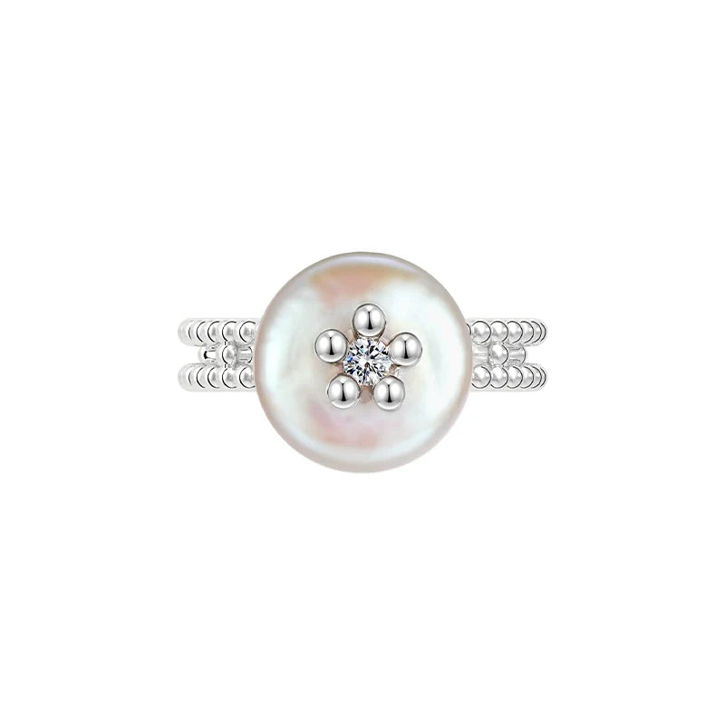 Elegant SUN HUNTER pearl riddle rings with a lustrous pearl and sparkling center design