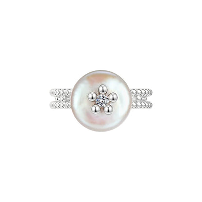 Elegant SUN HUNTER pearl riddle rings with a lustrous pearl and sparkling center design