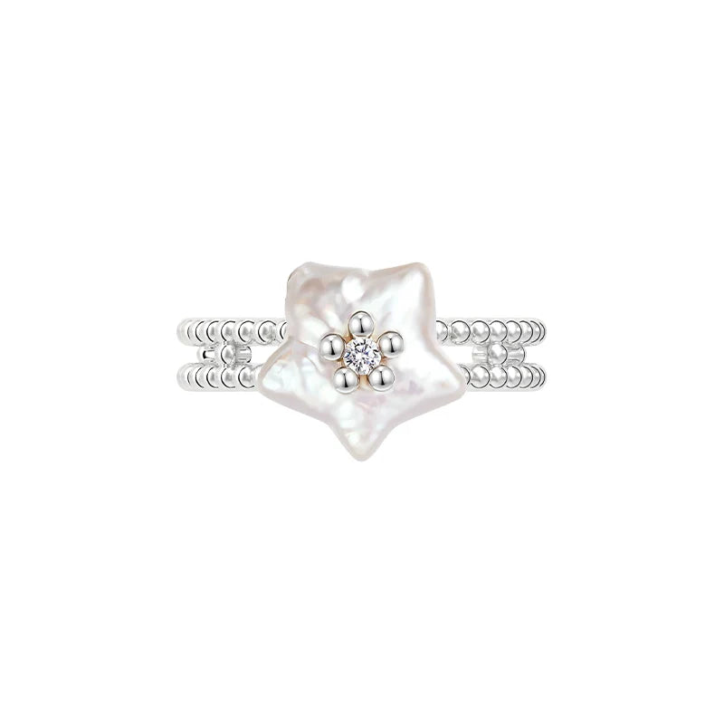 SUN HUNTER Pearl Riddle Rings featuring a beautiful floral design with a pearl centerpiece