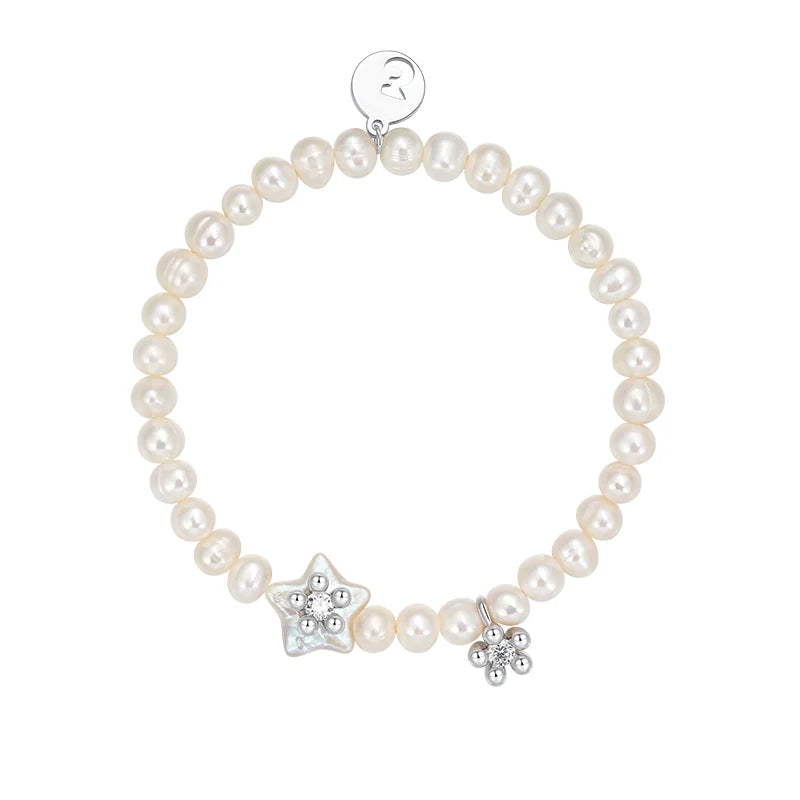 SUN HUNTER pearl star bracelet featuring freshwater pearls and a star charm for a stylish accessory