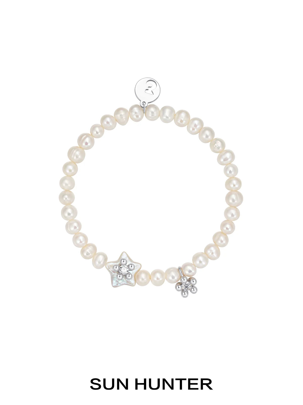 SUN HUNTER pearl star bracelet with natural pearls and star charms for elegant jewelry styling