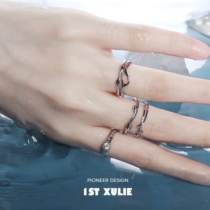 Elegant zircon silver ring displayed on hand, showcasing its delicate design and shimmer