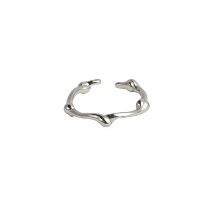 Minimalist silver line art ring featuring an abstract design for modern jewelry lovers