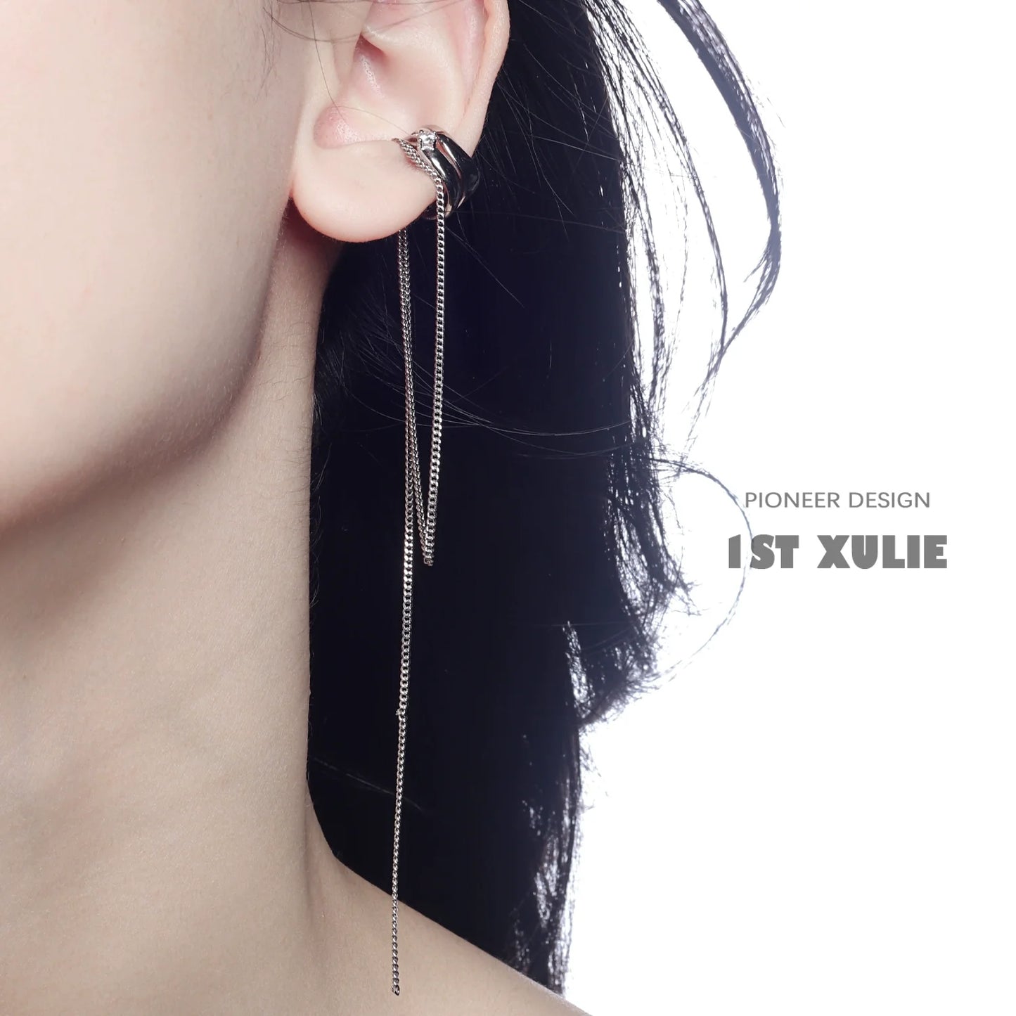 Stylish punk tassel ear cuff from 1STXULIE featuring a sleek design and chain detail